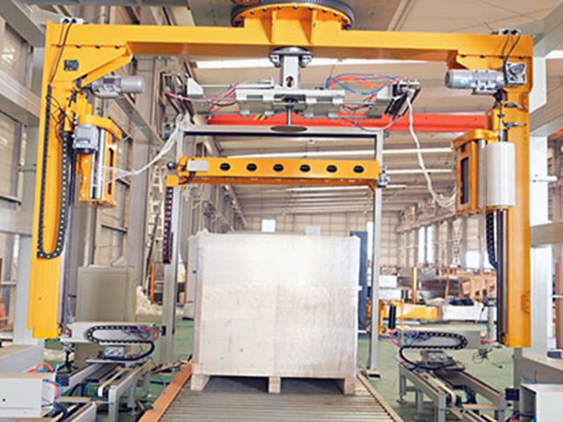 摇臂覆膜缠绕机.jpg 摇臂覆膜缠绕机.jpg