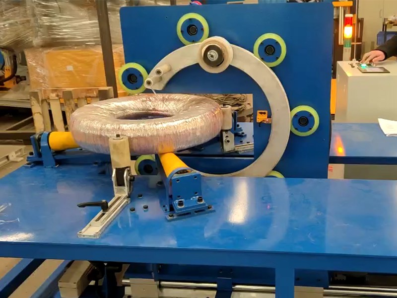 卧式环体缠绕包装机.jpg 卧式环体缠绕包装机.jpg