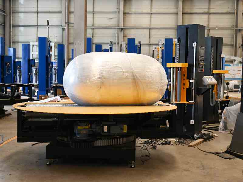 称重式圆筒纸缠膜机.jpg 称重式圆筒纸缠膜机.jpg