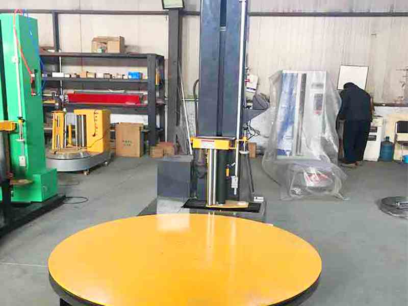 自动称重式缠绕膜包装机.jpg 自动称重式缠绕膜包装机.jpg