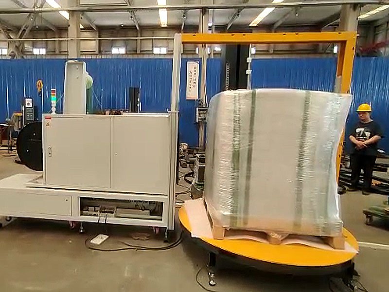 托盘式缠膜打带一体机实装应用，出货包装从此不用来回折腾