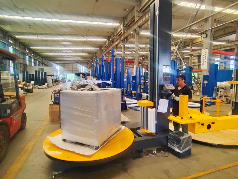 出货量大人工忙不过来？托盘自动缠绕包装机让包装节拍再提速