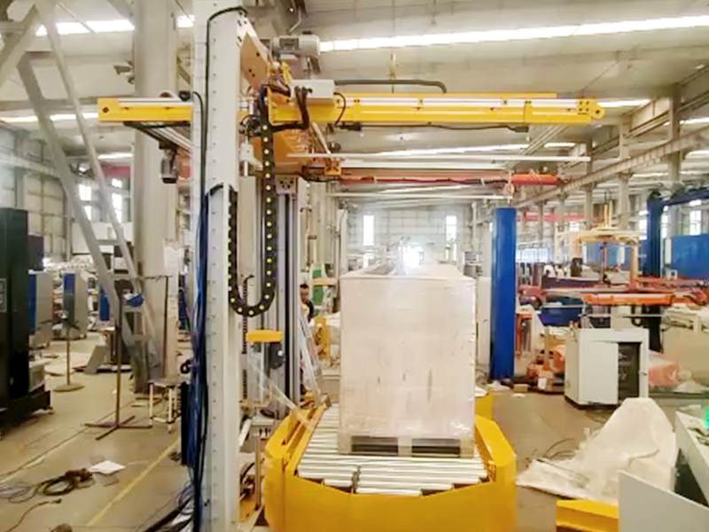 覆顶缠绕一体机：实现托盘货物全方位防护的高效方案