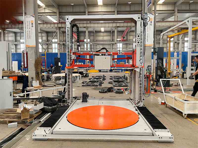 全自动缠绕打托一体机，缠膜+捆扎同步完成&nbsp;出货更稳更快更省人工