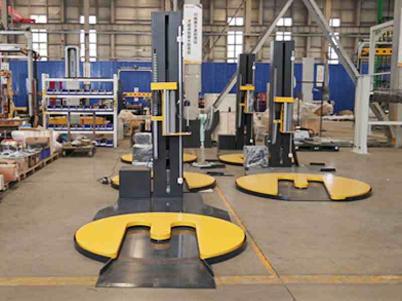 人工叉车难以上托？M型缠绕机提升托盘包装工位的操作便利性