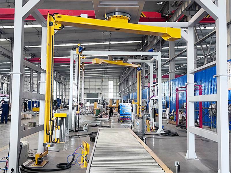 悬臂式托盘缠膜机&nbsp;解决不便旋转托盘的自动包装方式