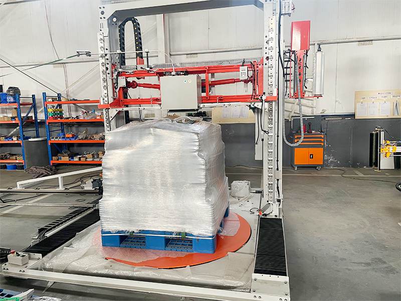 托盘出库需要多道包装工序？栈板自动缠膜打带一体机实现一次完成