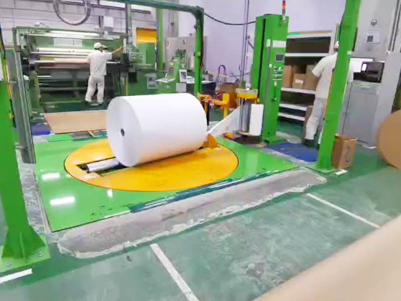 纸卷缠绕膜打包机实现圆筒型货物