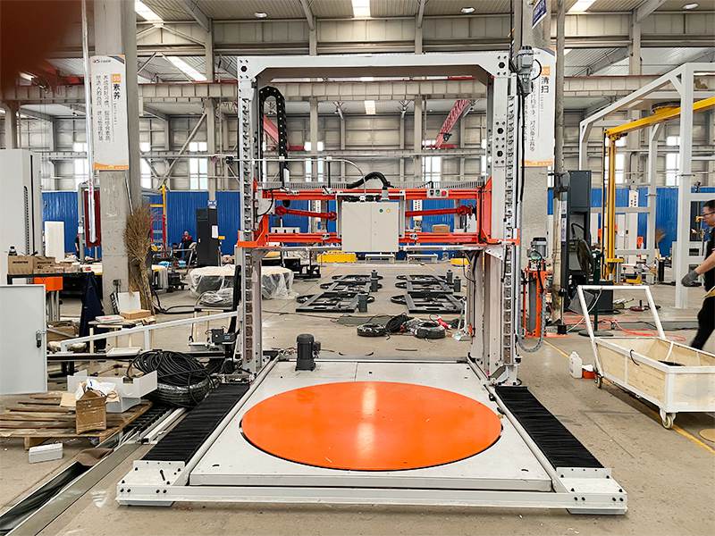 缠膜打带一体机在仓储出库包装中