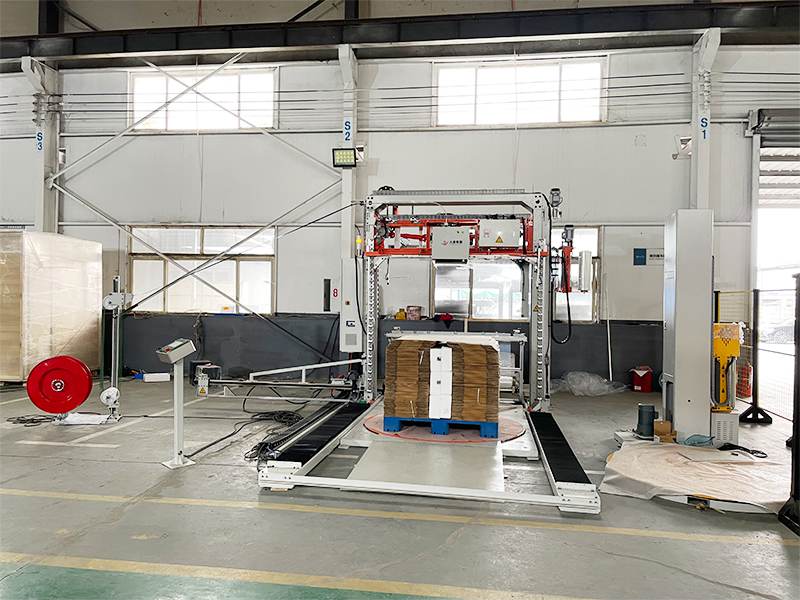 缠膜覆顶捆扎一体机实现托盘货物